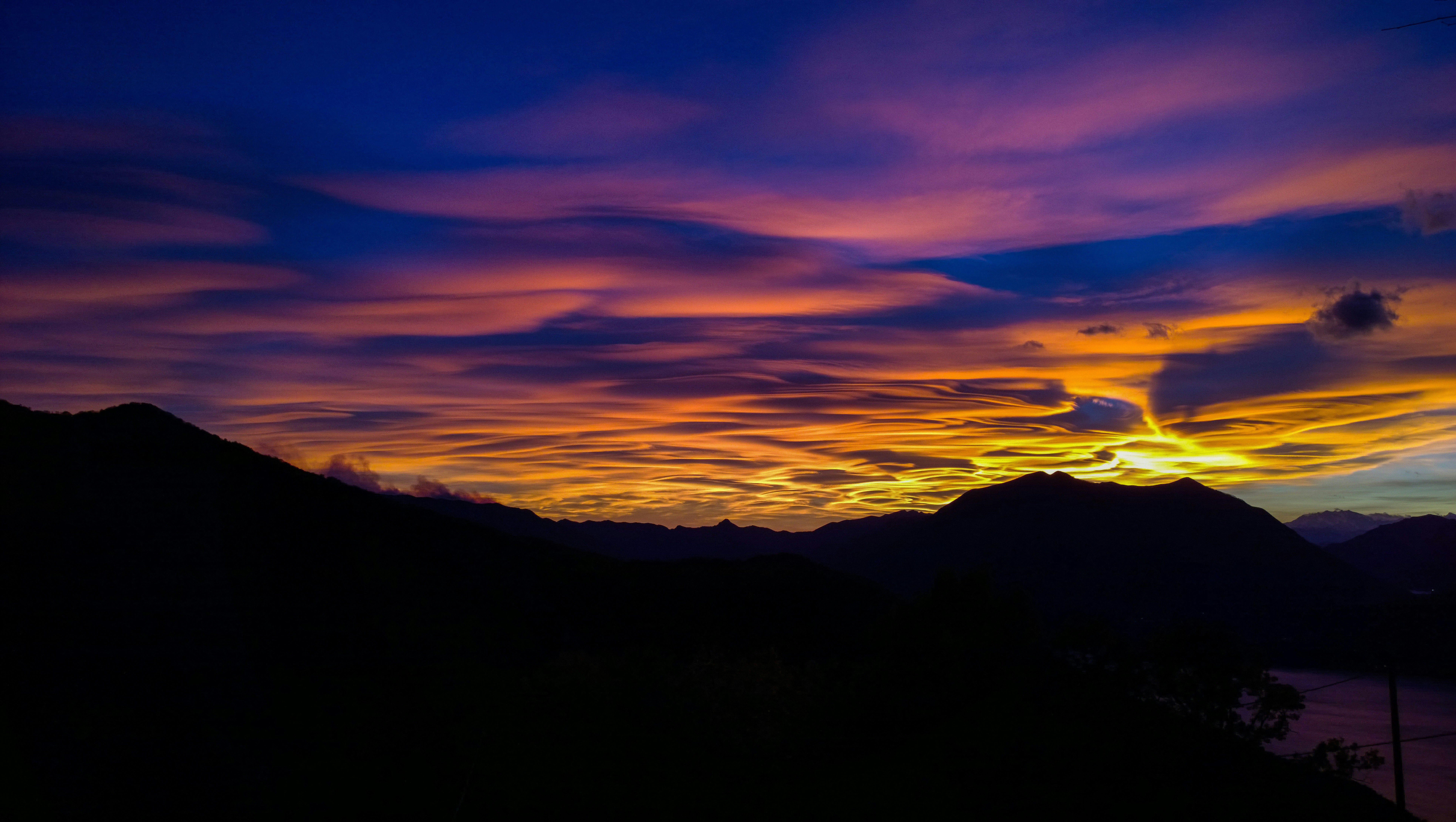 silhouette of mountain at golden hour